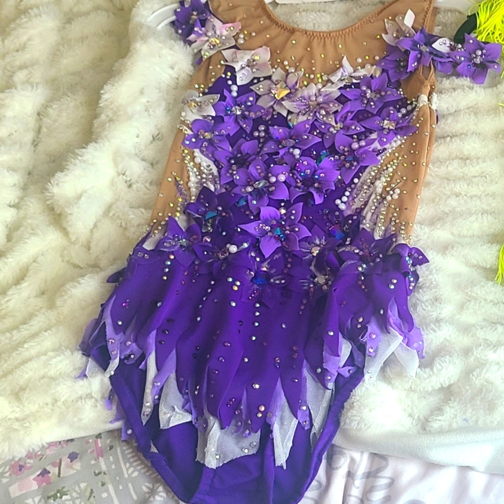 Purple rhythmic gymnastics leotard.